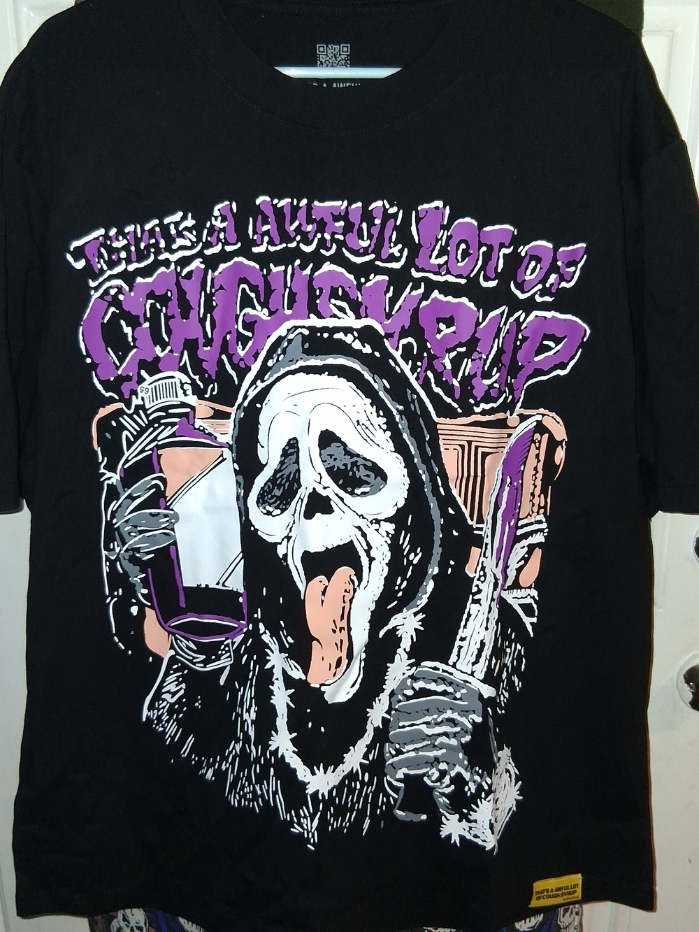 Graphic That's A Awful Lot Of Cough Syrup ScreamTee in Black, Purple & Cream